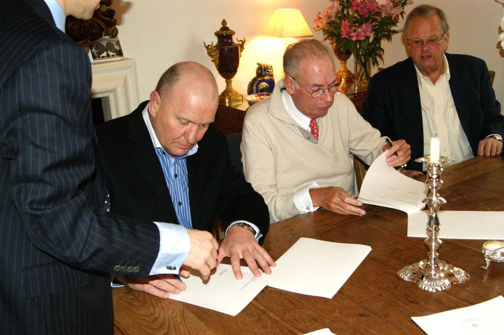 hesketh signover paul sleeman on left lord hesketh in centre next to lawyer